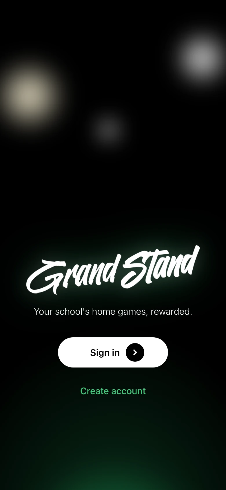 The GrandStand opening screen: the wordmark on black with a Sign in button and a Create account link